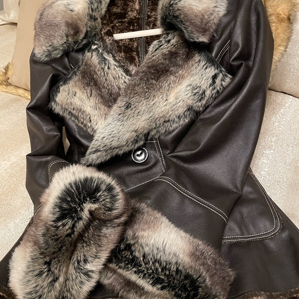 Dark brown leather jacket with brown fur inside size 6